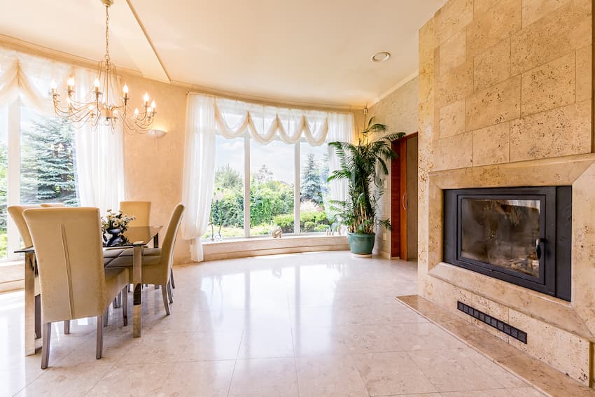 open-dining-space-with-chairs-and-fireplace